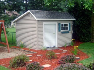 Garden Barn 2 - This simple design for a storage building will house the lawn equipment and backyard toys custom built by Martin's Mini Barns